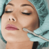A Female Beauty Seeker Laying Back While A Beauty Doctor is Examining Her Face For Cosmetic Surgery.